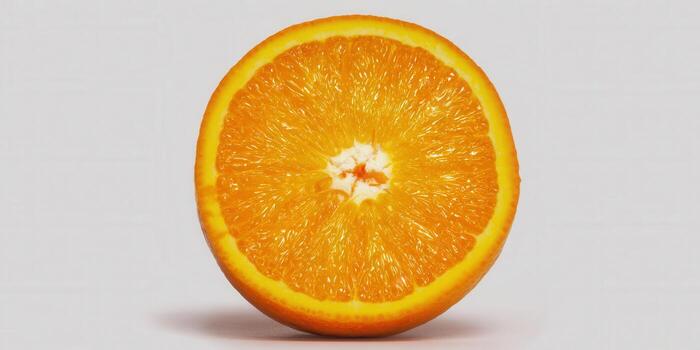 A close-up of an orange slice reveals intricate details of the fruit's texture and color. photo
