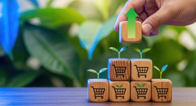 Sustainable Growth Concept Hand Placing Arrow Block Above Shopping Cart Blocks with Seedlings, Representing Business Growth photo