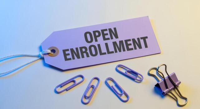 Open Enrollment Tag with Paperclips Representing Choices for Health, Insurance, Benefits, and Employee Programs photo