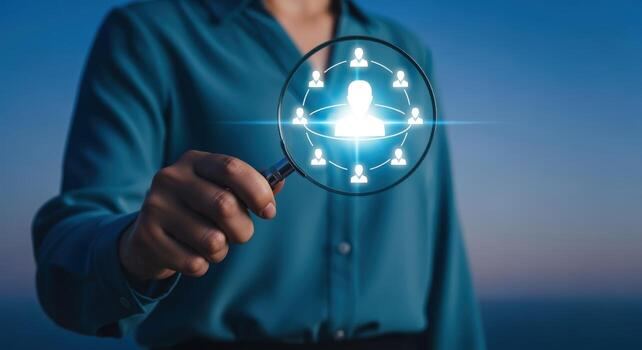 Human Resources Concept Magnifying Glass Focuses on Talent Acquisition, Recruitment, and Team Connection in Business photo