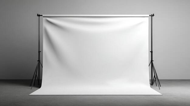 Studio Backdrop Setup with White Seamless Paper for Photography, Videography, and Content Creation on Gray Background photo