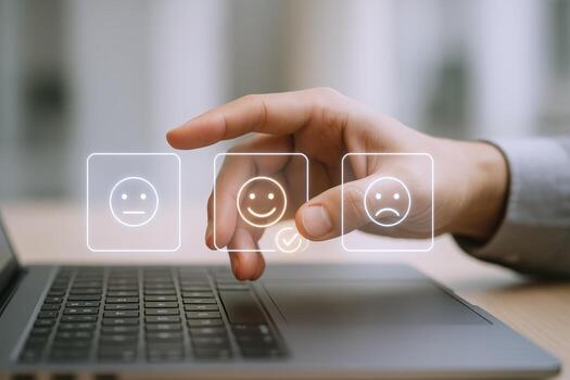 Customer Satisfaction Feedback Hand Selecting a Happy Smiley Face on a Laptop Interface photo