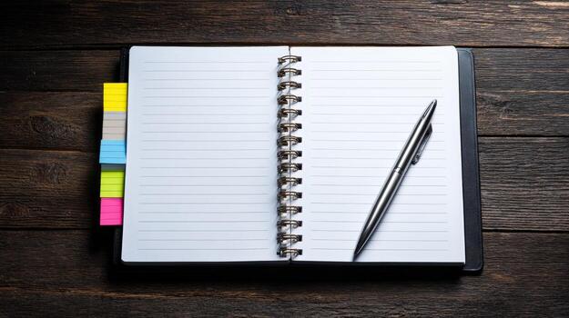 Open Spiral Notebook on Dark Wood Table with Pen and Colorful Sticky Notes Ready for Writing photo