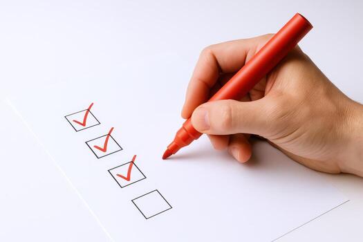 Checklist Completion Hand Marking Tasks with Red Pen on White Paper, Illustrating Productivity and Organization photo