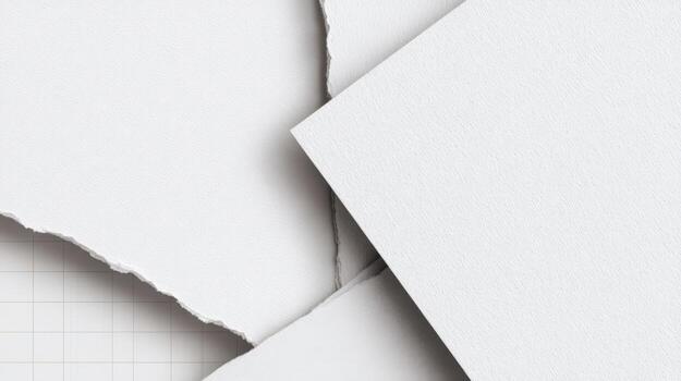 Abstract Paper Pieces Torn Edge Design on White Surface, Emphasizing Texture and Minimalist Composition photo