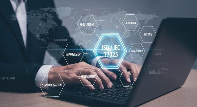 ISOIEC 17025 Accreditation Standards Concept Businessman using laptop demonstrating regulations, calibration, testing, and management system improvement photo