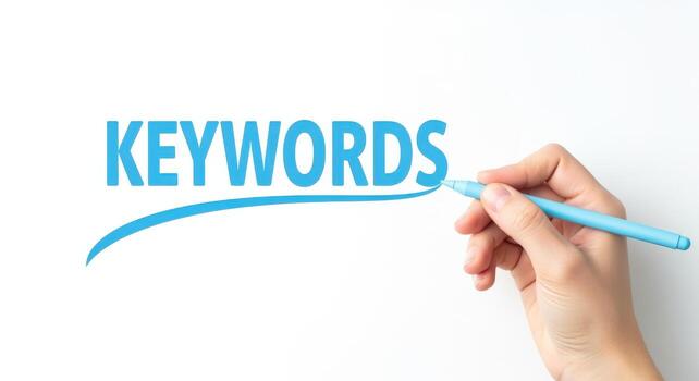 Keyword Concept with Hand Holding Pen Underlining the Word Keywords on White Background photo