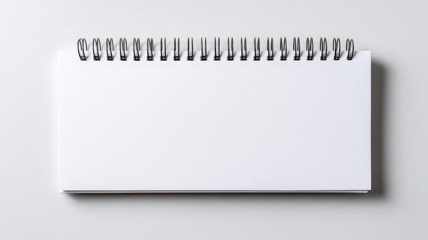 Blank Spiral Notebook Mockup with White Paper Sheets for Notes, Sketches, and Designs photo