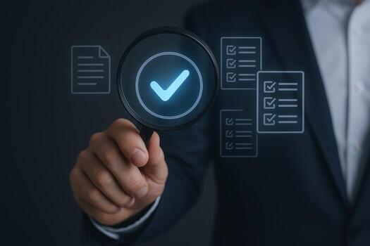 Quality Assurance Concept Magnifying Glass Inspecting Documents with Checkmarks for Approval and Validation Process photo