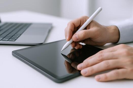 Digital Signature on Tablet Device Hand Holding Stylus for E-signing Documents and Agreements photo