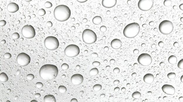 Water Droplets on Glass Surface A Refreshing and Clean Abstract Background for Product Presentation photo