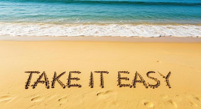 Relaxing Seaside Message Take it Easy Written in Sand on a Sunny Beach, Ocean Waves photo