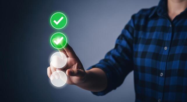 Hand interacting with virtual checklist, illustrating task completion, project management and digital to-do lists photo