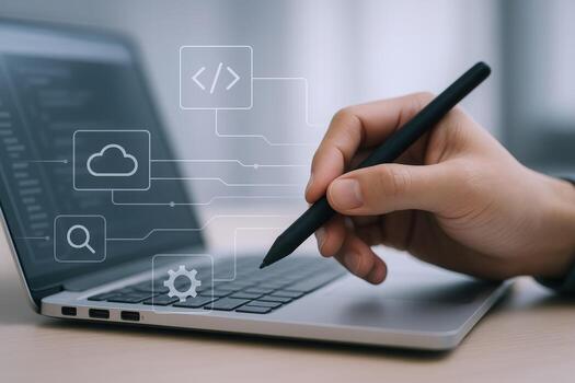 Close-up of Hand Using Stylus on Laptop with Cloud, Search, and Code Symbols Overlayed photo