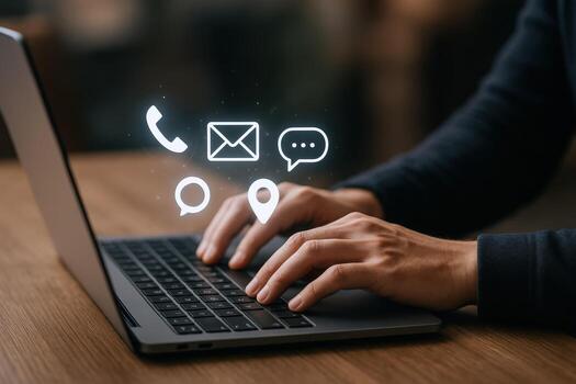 Hands Typing on Laptop with Communication Icons Contact, Email, Chat, and Location Concepts photo