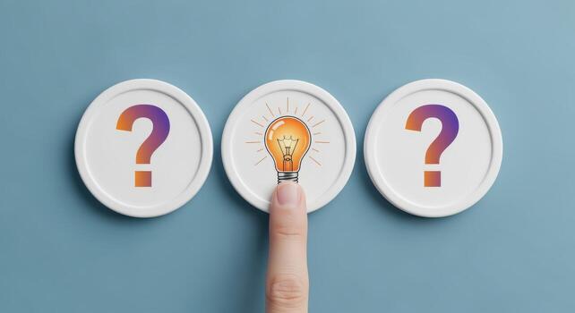 Solution Concept Hand Points to Lightbulb Between Question Marks, Representing Idea Generation and Problem Solving photo