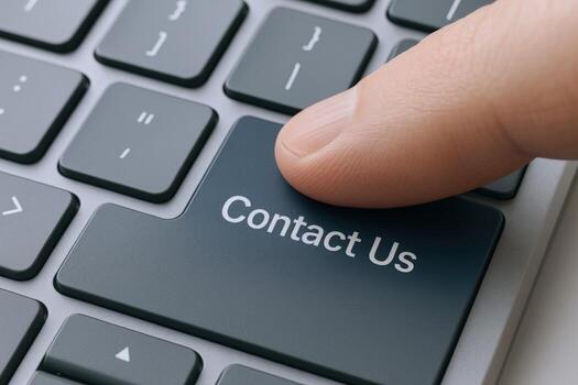 Pressing Contact Us Key on Keyboard to Initiate Communication or Reach Customer Support Services photo