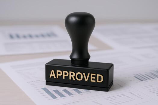 Approved Stamp on Financial Document Symbol of Agreement, Confirmation and Authorization in Business photo