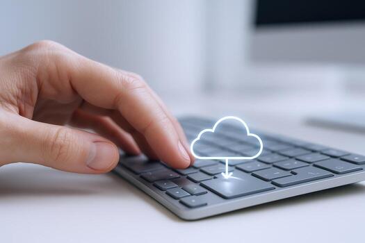 Cloud Computing Concept Hand Typing on Keyboard with Cloud Download Symbol for Data Transfer photo