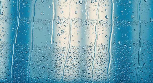 Raindrops on Glass Atmospheric Weather Pattern with Water Droplets, Condensation, and Blue Tint Background photo
