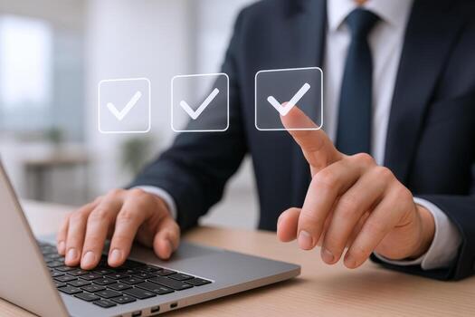 Businessman selecting options from a checklist Using a computer to complete tasks and approve projects photo