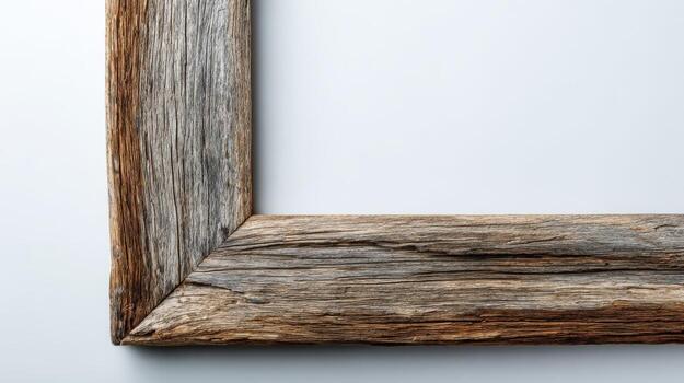 Rustic wooden frame corner on white background, weathered reclaimed wood texture, blank space for text or image photo