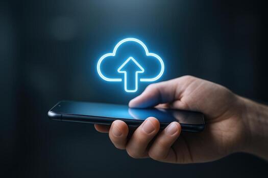 Cloud Upload on Mobile Hand Holding Smartphone with Glowing Cloud Computing Icon for Data Transfer photo