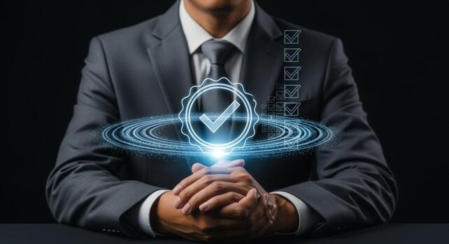 Business Professional Displaying Approval Sign with Checkmarks and Digital Hologram on Black Background photo