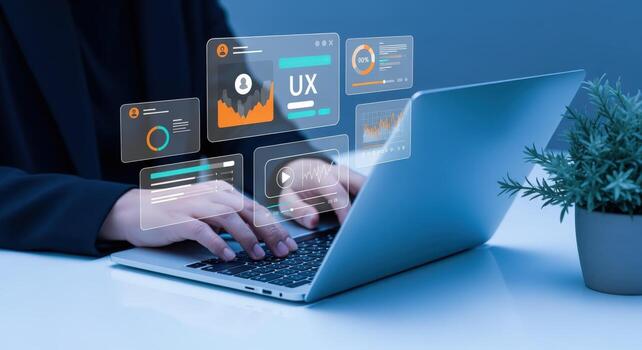 Businesswoman Using Laptop Analyzing Data Visualizations, Representing UX Design and Information Technology in the Digital Age photo