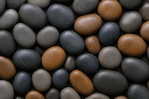 Smooth Polished Stones A Textured Background of Earthy Tones Perfect for Wellness and Relaxation Concepts photo