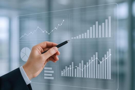Analyzing Financial Data on Transparent Screen Hand with Pen Pointing at Growth Charts photo
