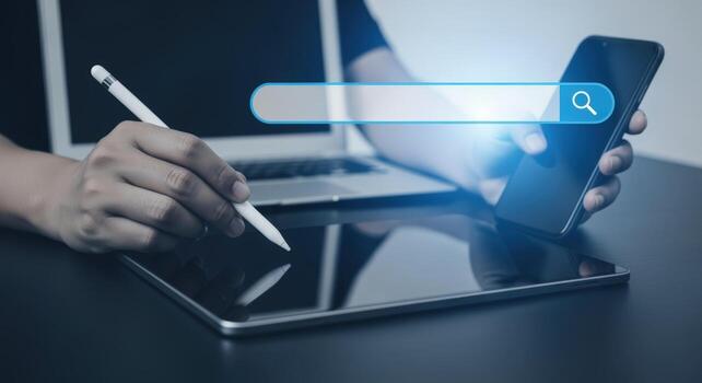 Digital Designer Working with Devices Showing Search Bar, Enhancing User Experience for Modern Applications photo