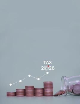 Stack of coins with virtual increasing graph. The concept about saving money to paying tax in year 2026 photo