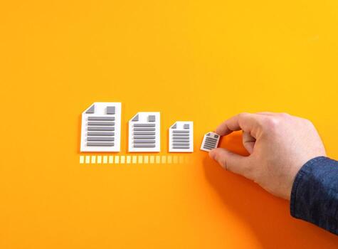 Reducing paper documents in favor of digitalization. Relaxing regulatory rules, reducing bureaucracy, digital economy, e-government, workflow efficiency, innovation in business processes. photo