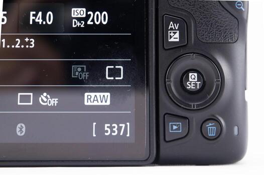 Camera LCD Screen Displaying Settings - Aperture ISO RAW Format and Image Count. photo