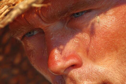 A man wearing a straw hat photo