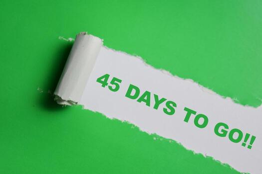 45 Days to go Text written in torn paper photo