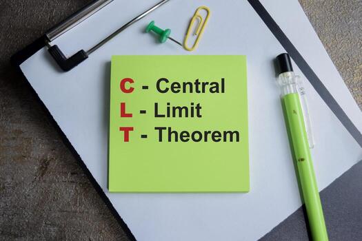 Concept of CLT - Central Limit Theorem write on sticky notes isolated on Wooden Table. photo