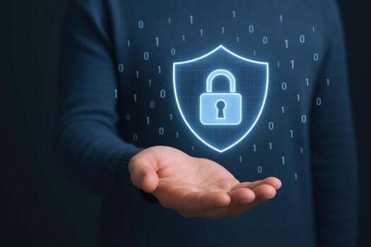 Cybersecurity Protection Concept Hand Holding a Glowing Shield with Padlock, Digital Data and Binary Code photo