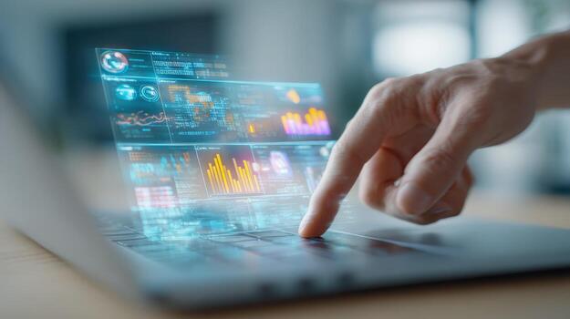 Hand Interacting with Holographic Data Visualization on Laptop Futuristic Interface for Business Analytics photo