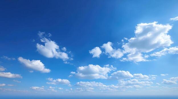 Vibrant Blue Sky with Fluffy White Clouds on a Sunny Day, High-Resolution Atmospheric Scene photo