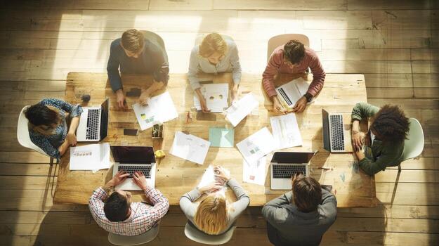 Diverse Team Collaboration in Modern Office Space for Strategic Planning and Business Development photo