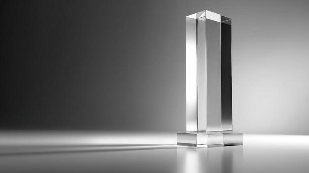Elegant Crystal Award Obelisk on Reflective Surface for Corporate Recognition and Achievement Presentation photo