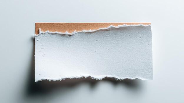 Torn Paper Edge Reveals a Neutral Background, Ideal for Text Overlays and Mockups photo