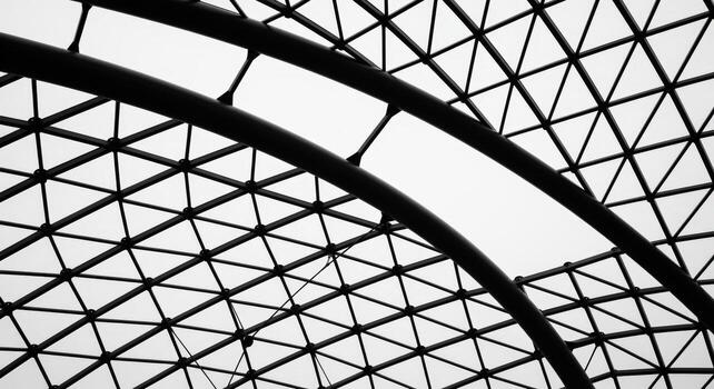 Abstract Architectural Structure in Black and White Geometric Design with Steel Arches and Triangular Patterns photo