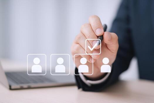 Human Resources professional selecting applicant with digital interface in office, hiring and recruitment concept photo