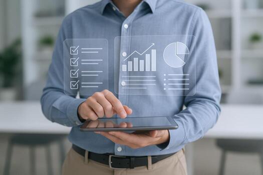 Business Professional Analyzing Data and Charts on a Tablet, with a Modern Graphical Interface Overlay photo