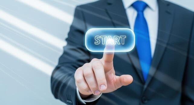 Man in Suit Pressing Virtual Start Button, Symbolizing New Business Ventures and Beginnings photo
