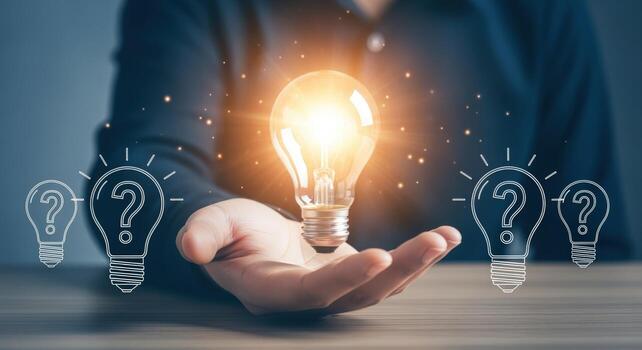 Innovative Solution A Person Holding a Glowing Light Bulb Surrounded by Question Marks, Representing Problem Solving photo