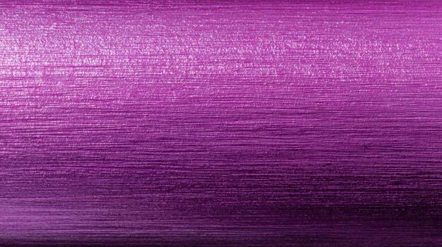 Close-up of Textured Purple Metallic Surface Showing Gradient and Linear Pattern for Backgrounds or Design Elements photo